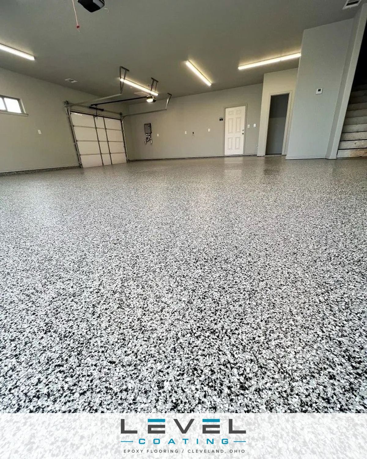 Diamond-ground and sealed flake floor by Level Coating